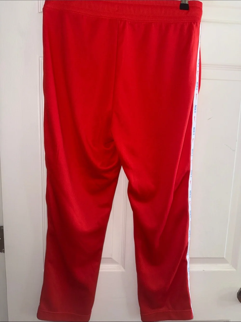 Nike Red Track Pants with White Logo Tape
